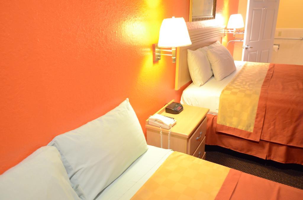 Louetta Texan Inn & Suites المظهر الخارجي الصورة