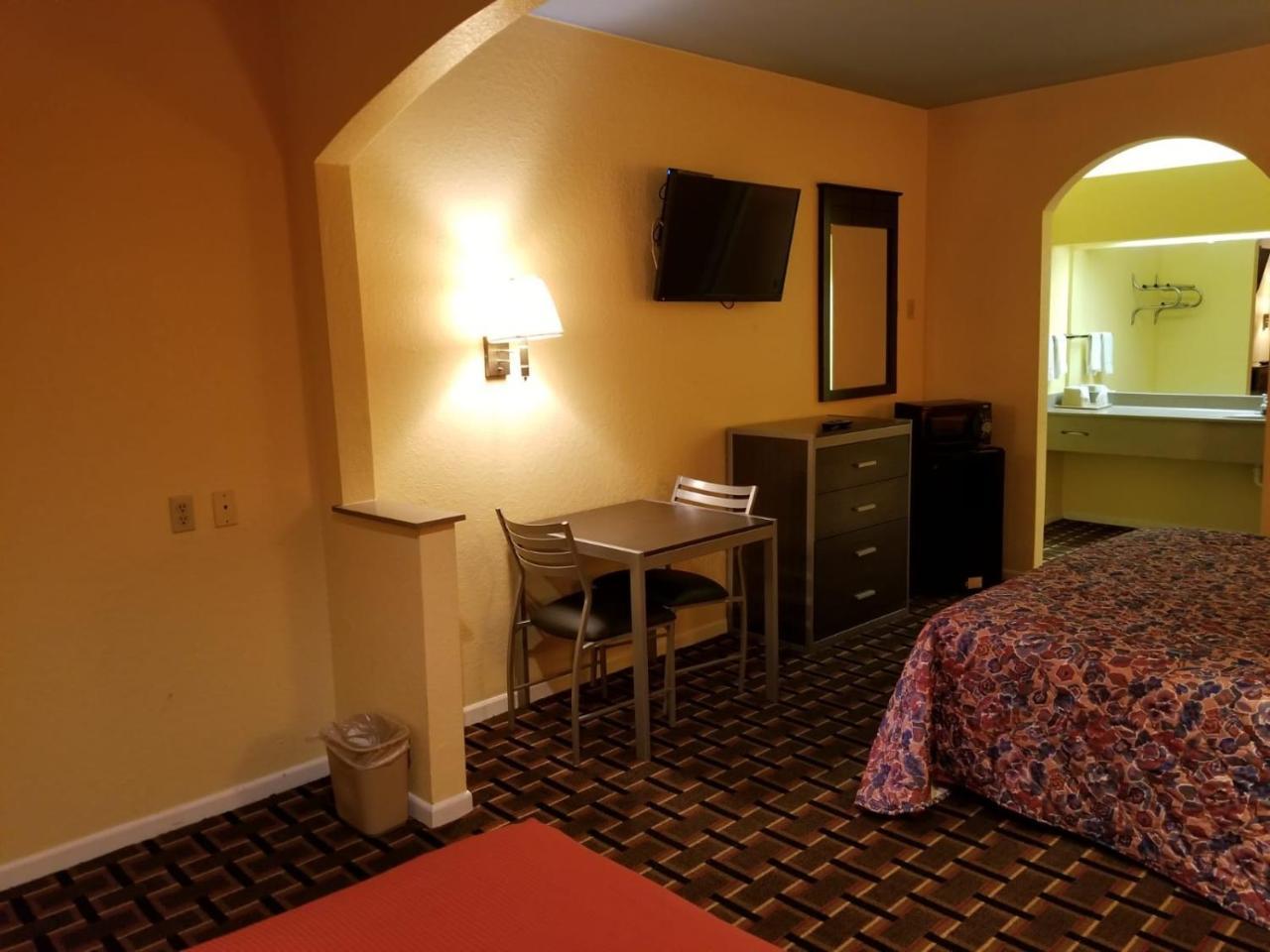 Louetta Texan Inn & Suites المظهر الخارجي الصورة