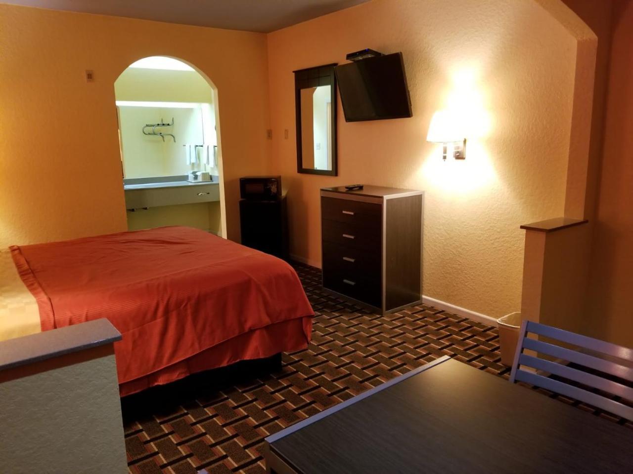 Louetta Texan Inn & Suites المظهر الخارجي الصورة